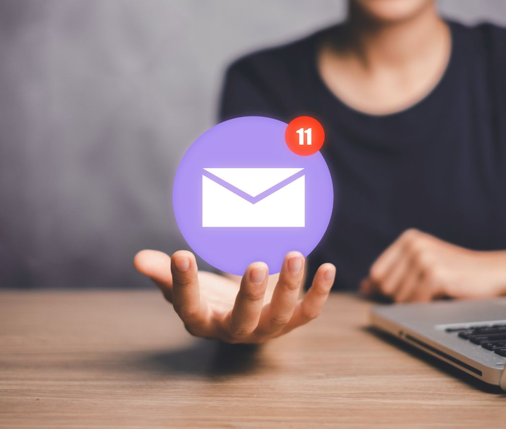 email icon floating in hand