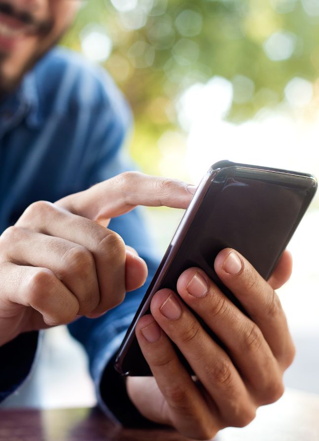 looking at website on mobile phone